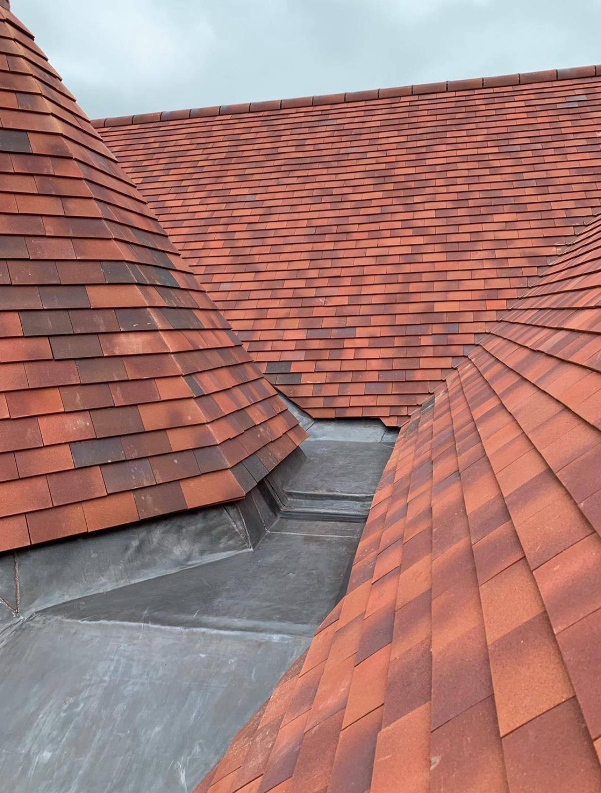 Lead-lined valley between tiled roof slopes